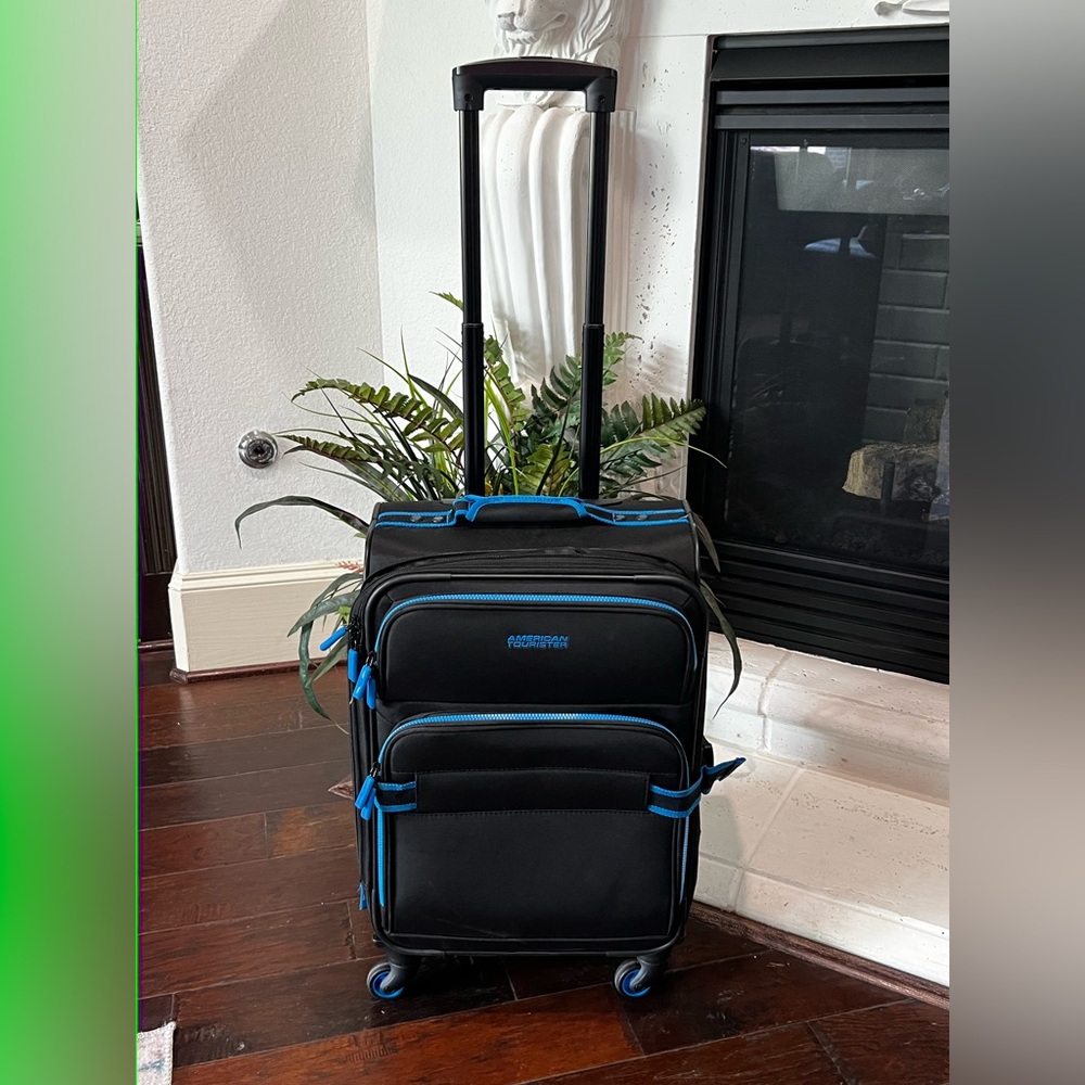 American Tourister Black and Blue Carry-On Spinner Suitcase